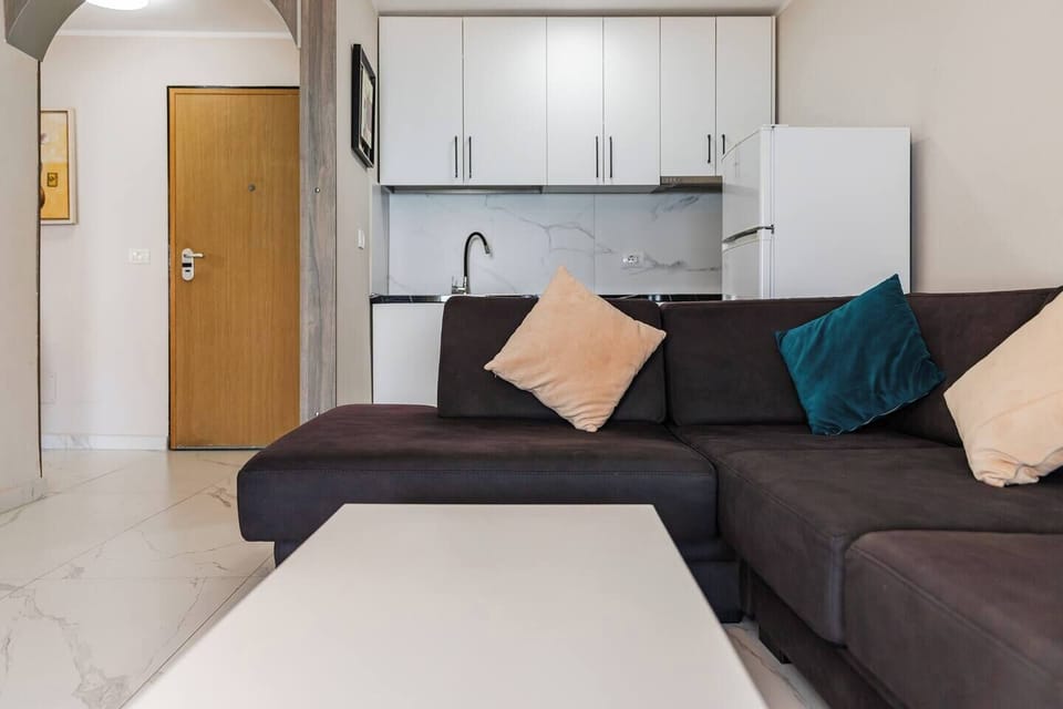 Living room and fully-equipped kitchen