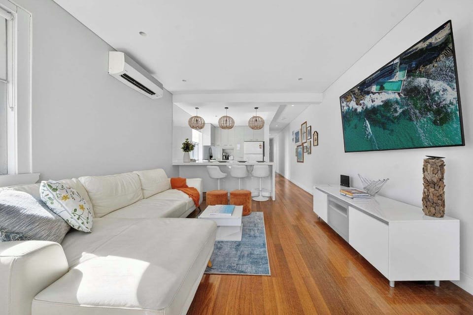 Open Plan Lounge, filled with natural day light and views of Bondi Beach