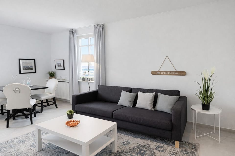Luxury Condo, Garden View | Living area | 40-inch Smart TV with cable channels, Netflix, Hulu