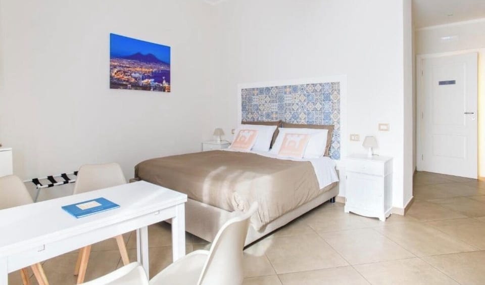 Quadruple Room, Balcony, City View | In-room safe, desk, blackout drapes, soundproofing