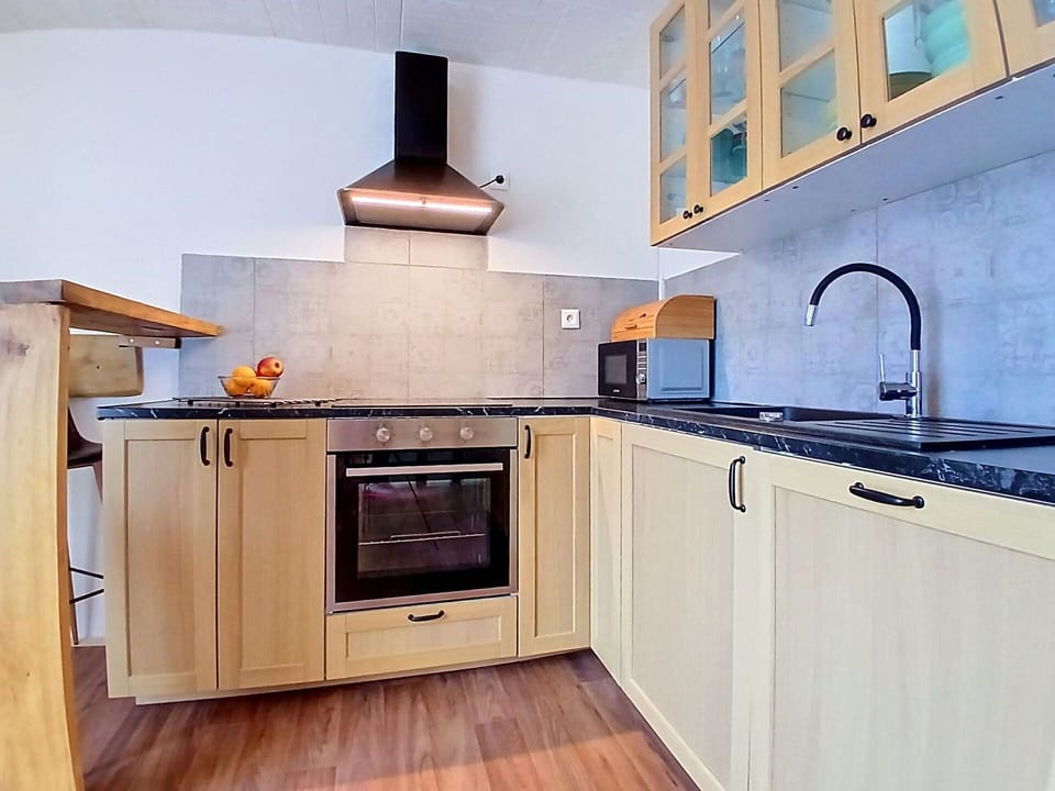 Kitchen Appliance, Kitchen, Countertop, Major Appliance, Wood, Cabinetry, Flooring, Interior Design, Floor, Home Appliance