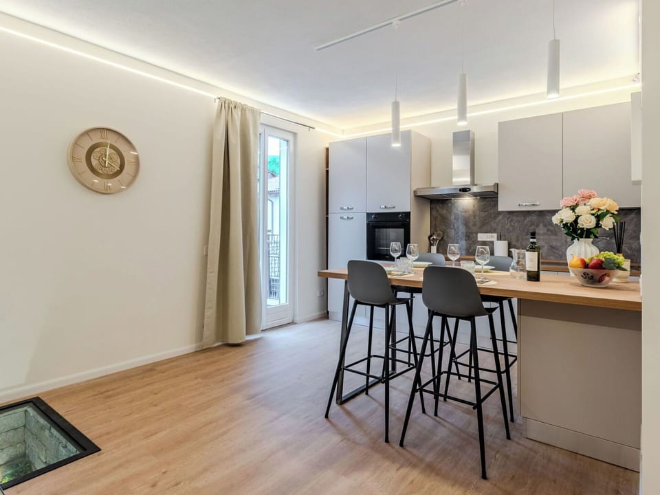 Furniture, Interior Design, Flooring, Wood, Ceiling, Countertop, Floor, Light Fixture, Home, Kitchen