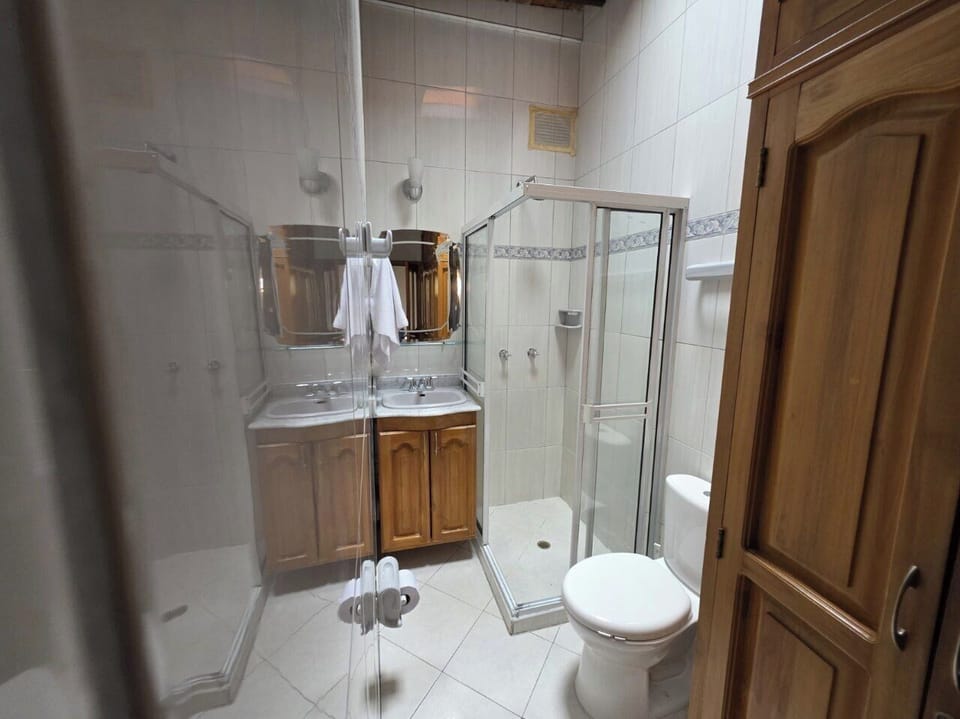 Standard Double Room | Bathroom | Shower, towels, soap, toilet paper