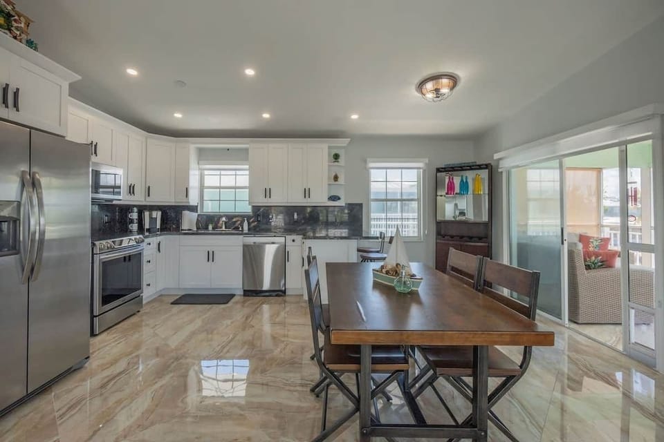 Cook and gather in the bright kitchen with plenty of prep space.