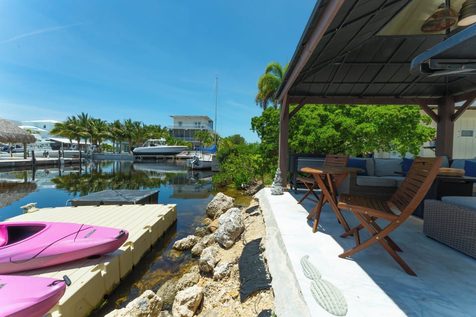 Sit by the canal with peaceful water views and a private setting.