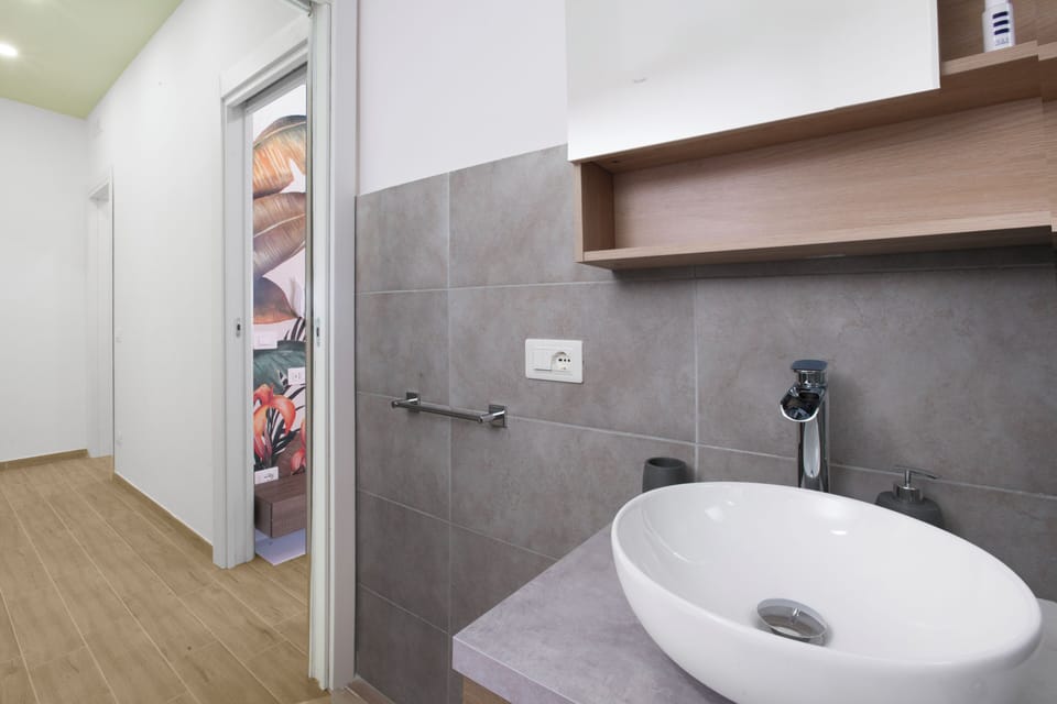 Apartment, 2 Bedrooms, Balcony | Bathroom | Shower, free toiletries, hair dryer, bidet