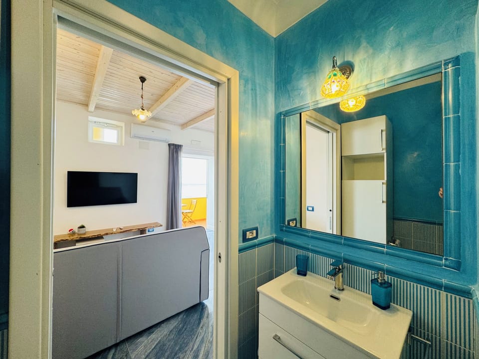 Apartment, Balcony, Sea View | Bathroom | Shower, free toiletries, hair dryer, bidet