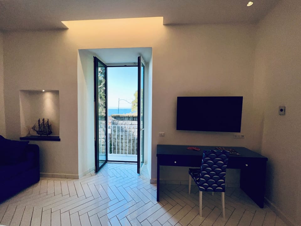 Apartment, Balcony, Partial Sea View | Water view