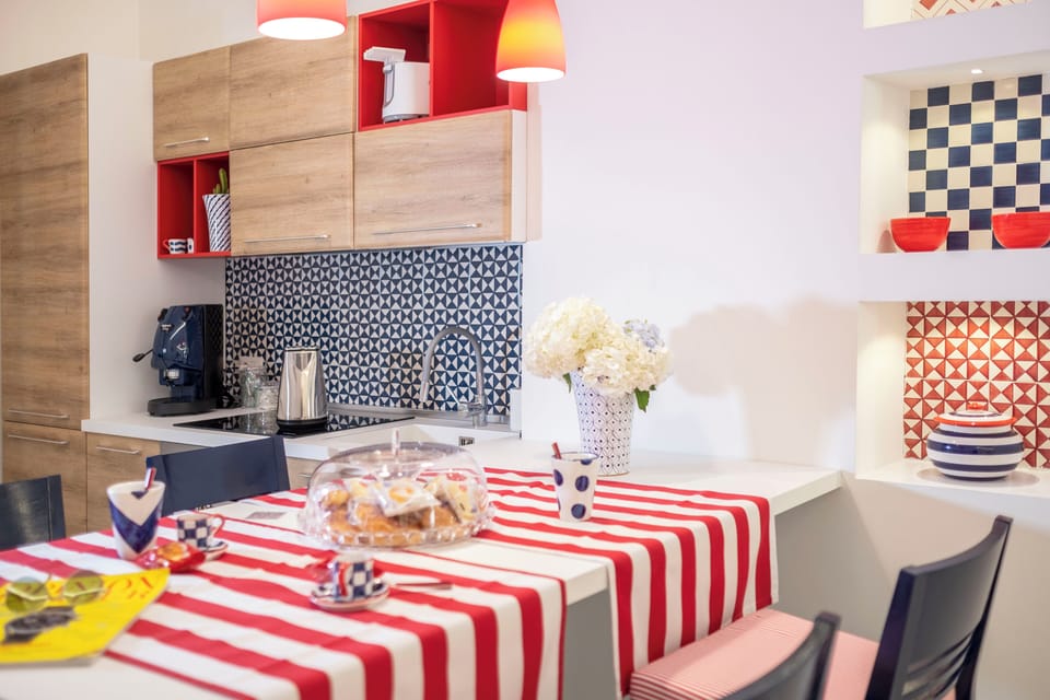 Deluxe Apartment, 4 Bedrooms, City View | Private kitchen | Oven, stovetop, espresso maker, electric kettle