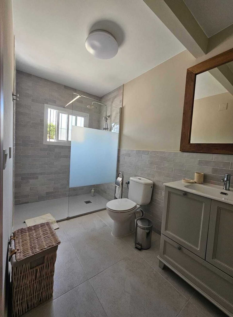 large walk in shower, great for after a long day at the beach