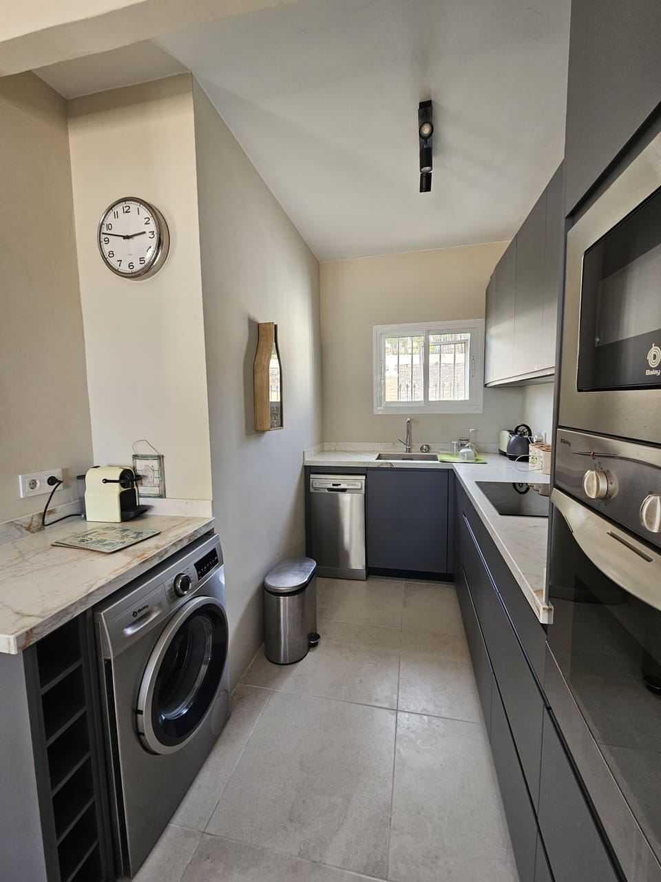 galley stlyle fully equipped modern kitchen