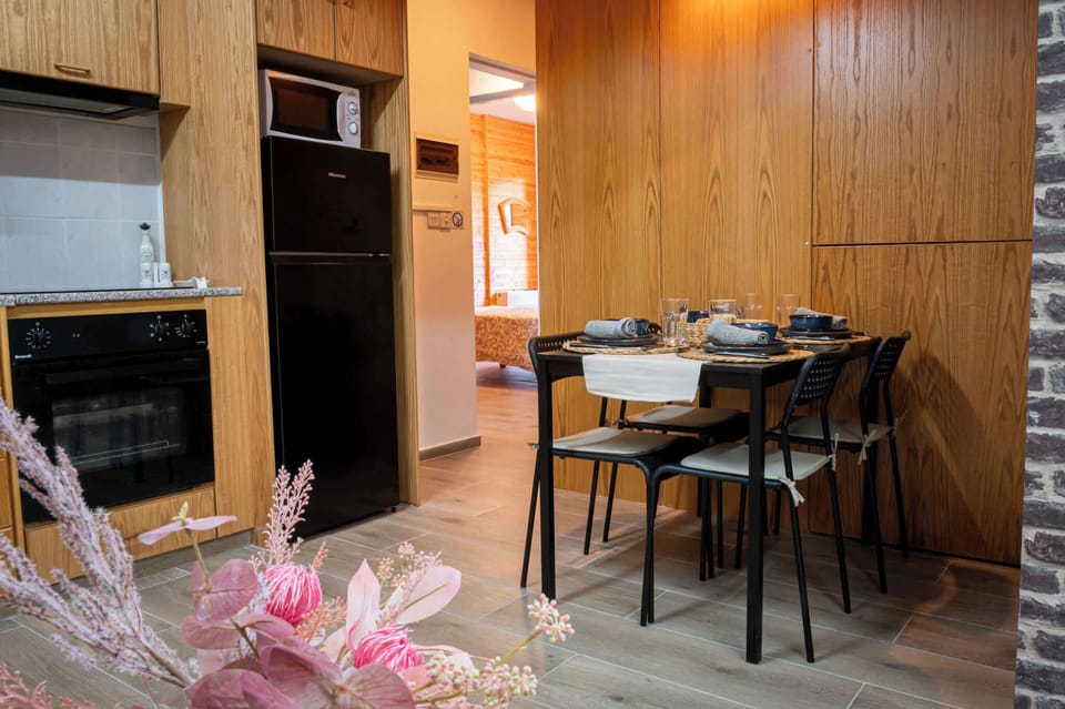 Gather around the dining space and enjoy relaxed dinners in a comfortable open-plan kitchen and dining area, designed for easy cooking and shared moments.