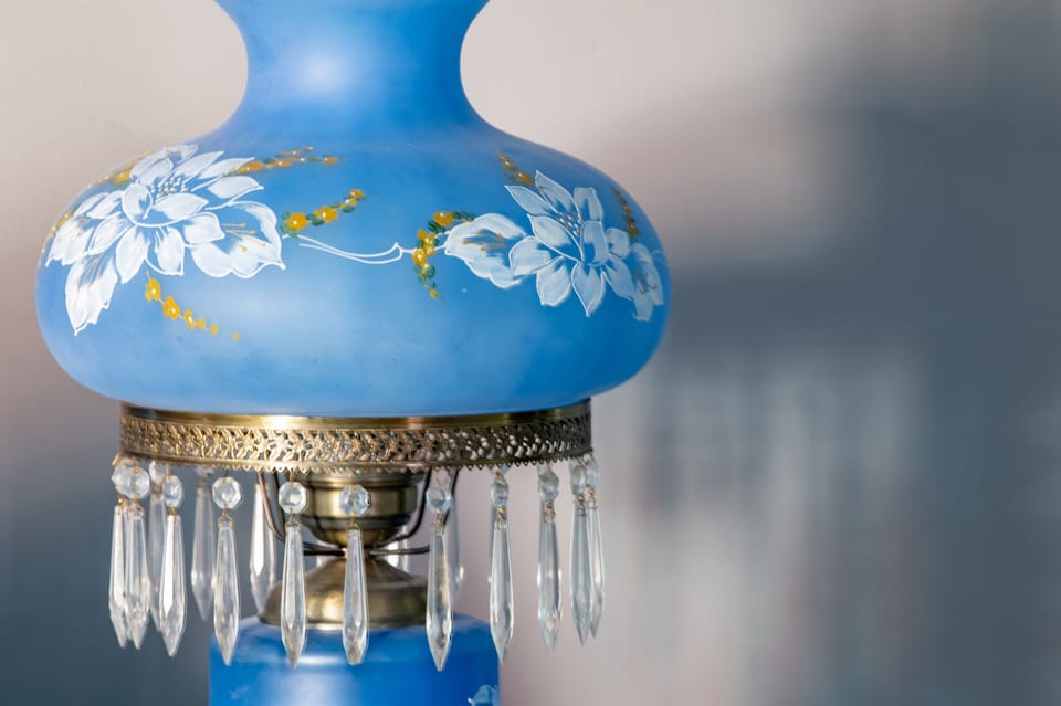 A closer look at one of the suite’s antique touches—this beautifully detailed lamp adds a hint of vintage elegance and character to the space.
