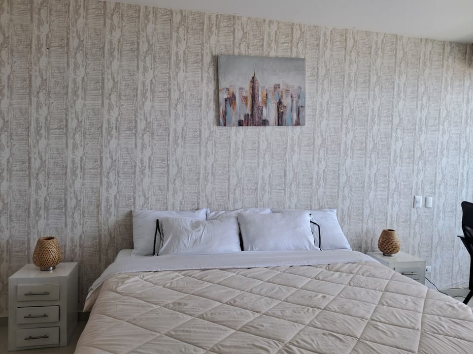 Deluxe Apartment, Balcony, Beach View | Blackout drapes, free WiFi
