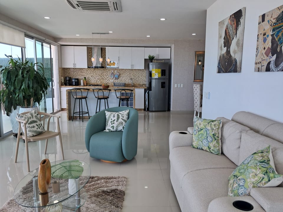 Deluxe Apartment, Balcony, Beach View | Living area