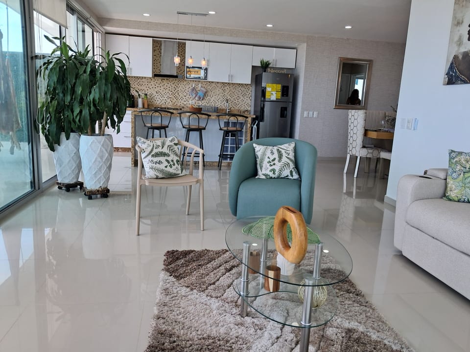 Deluxe Apartment, Balcony, Beach View | Living area