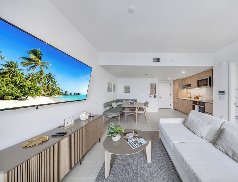 Condo, Balcony, City View | Living area | 36-inch Smart TV with cable channels