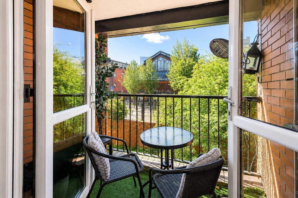 Balcony Retreat: Sip your morning coffee while enjoying vibrant city views and fresh air!