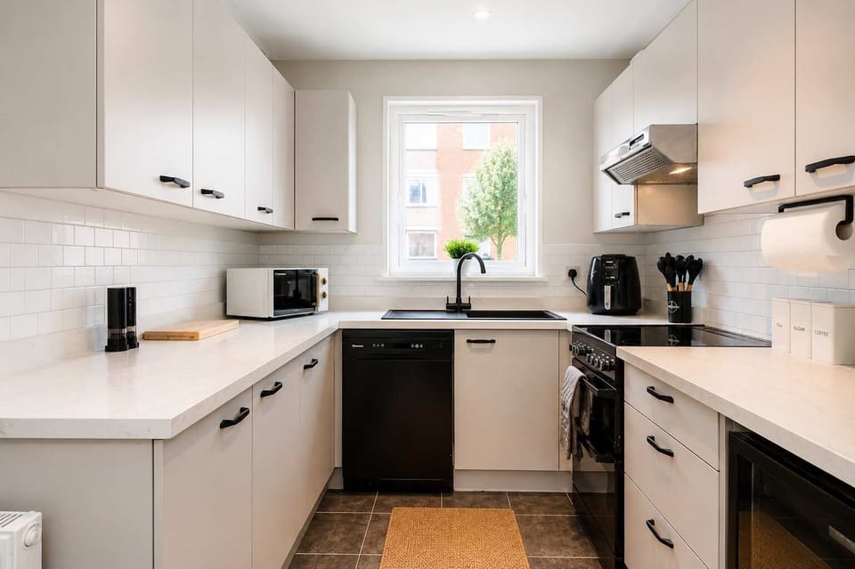 Kitchen: Modern appliances and sleek design for culinary adventures in Greater Manchester!