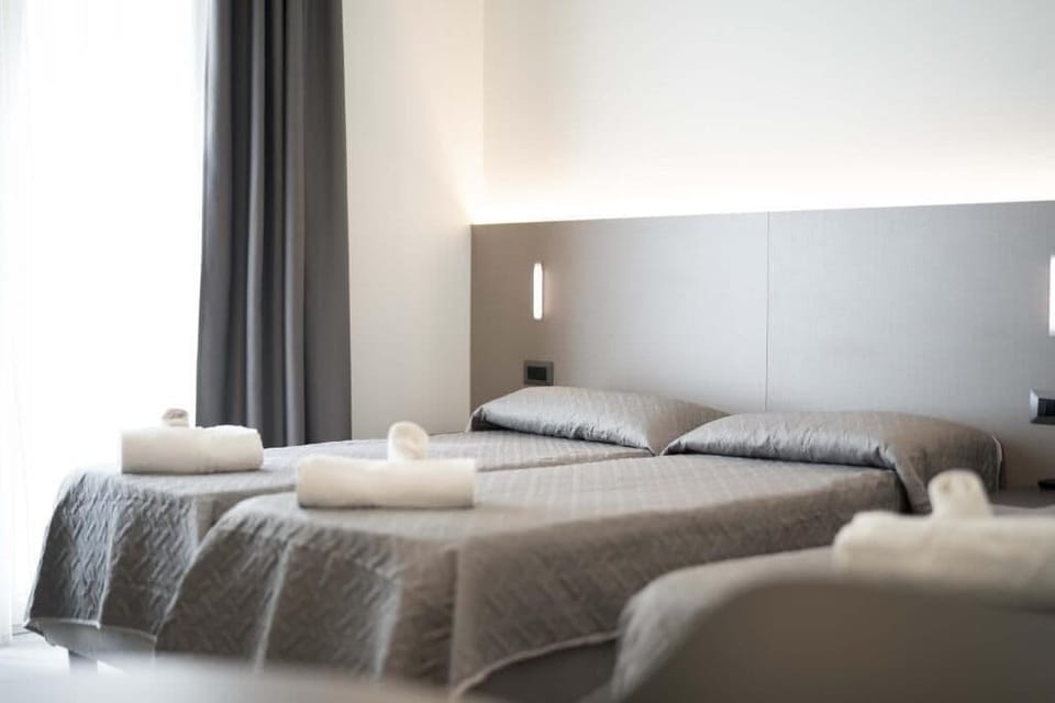 Junior Suite, Balcony, Partial Sea View | In-room safe, laptop workspace, free WiFi, bed sheets