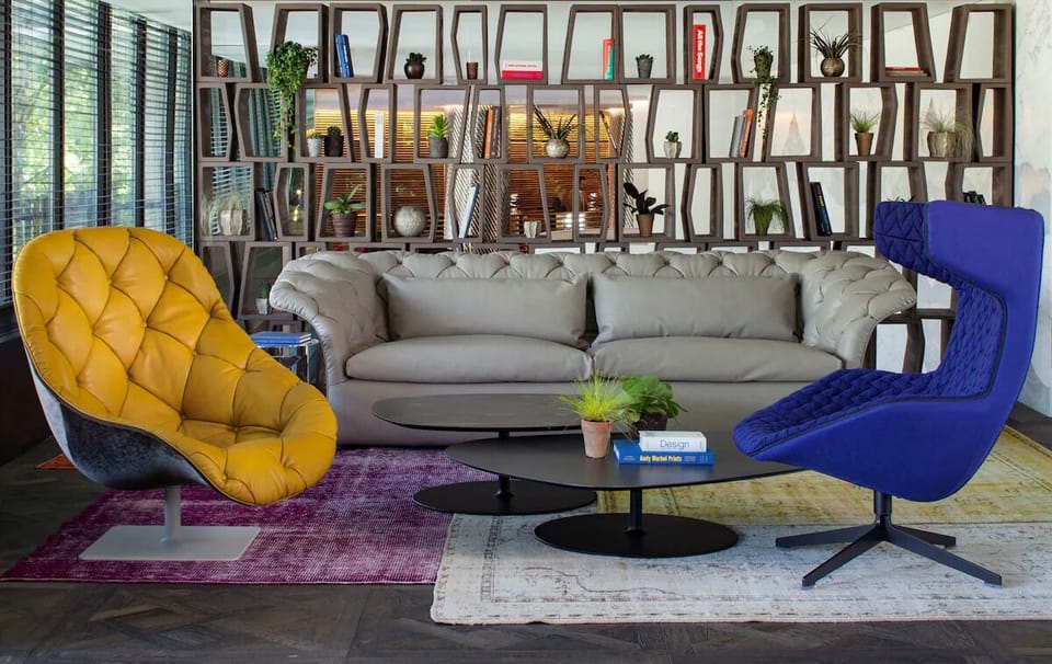 Linger with a book in a cozy, design-led library lounge.