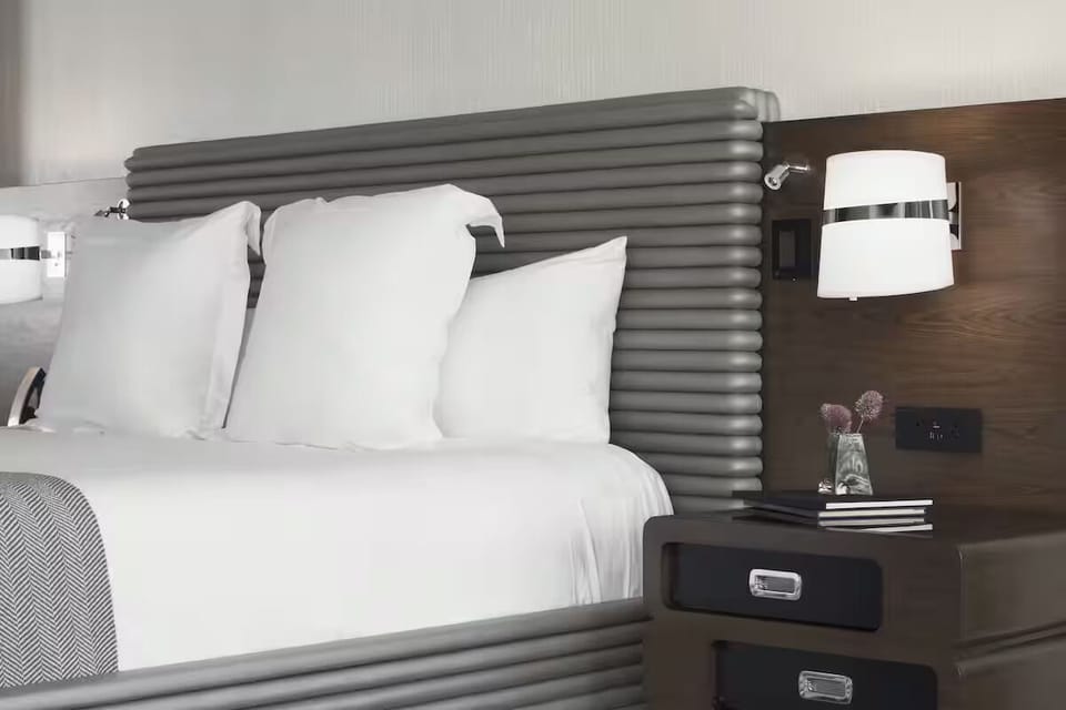 Drift off fast with crisp linens and supportive pillows.