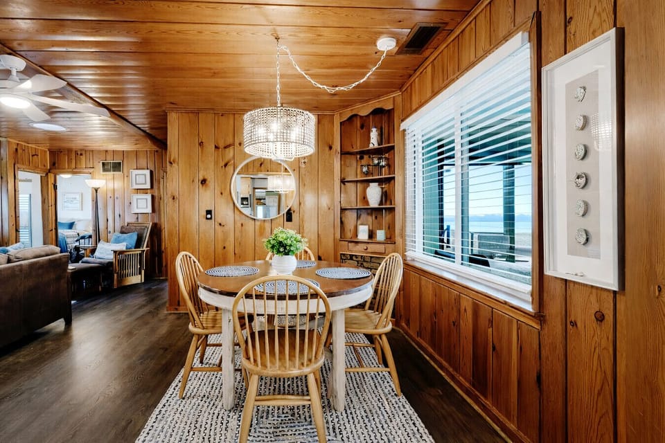 Main House Dining Area | Round Table | Sliding Window & Outdoor View