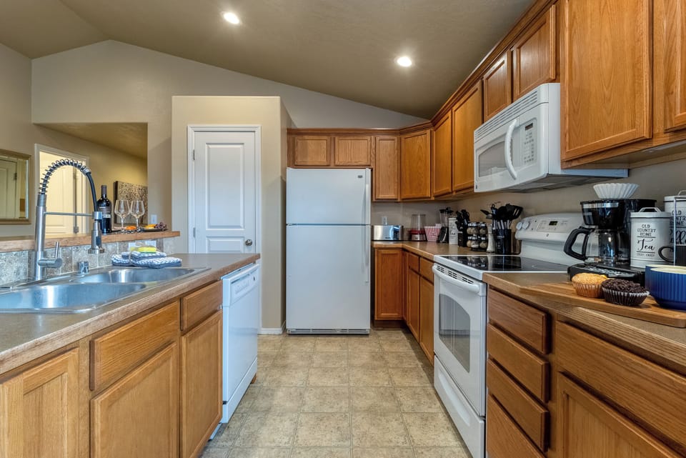 Full kitchen with generous counter space and modern appliances.