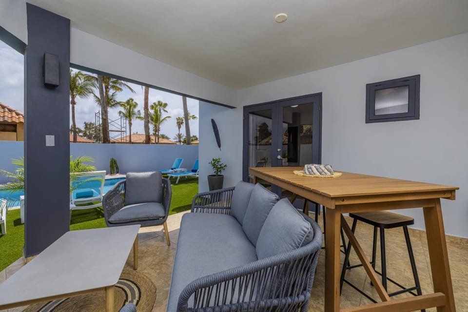 Spacious patio perfect for morning coffee or evening relaxation in a tropical setting