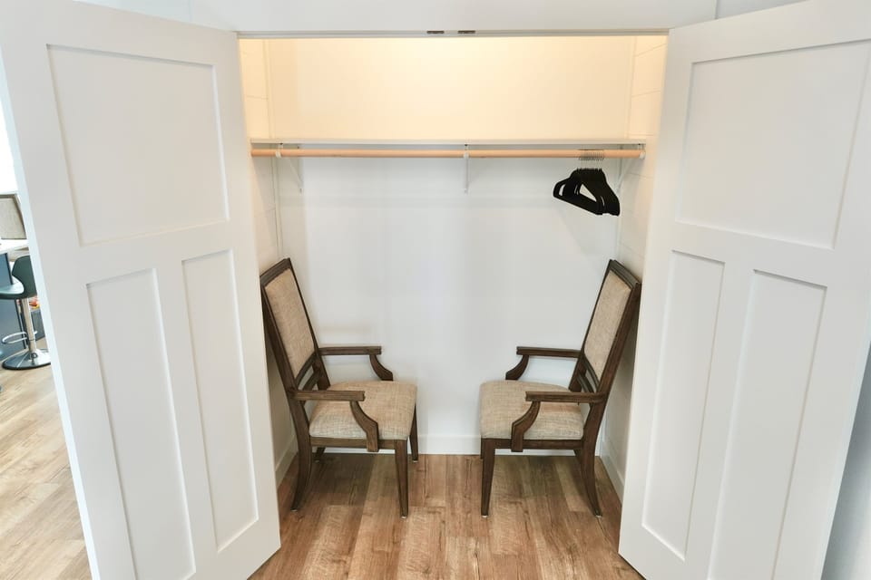 Extra Chairs for Dining in Closet on Main Floor just off Kitchen