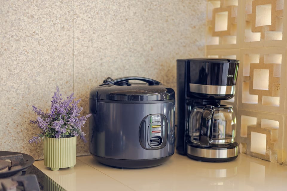Fridge, microwave, stovetop, coffee/tea maker