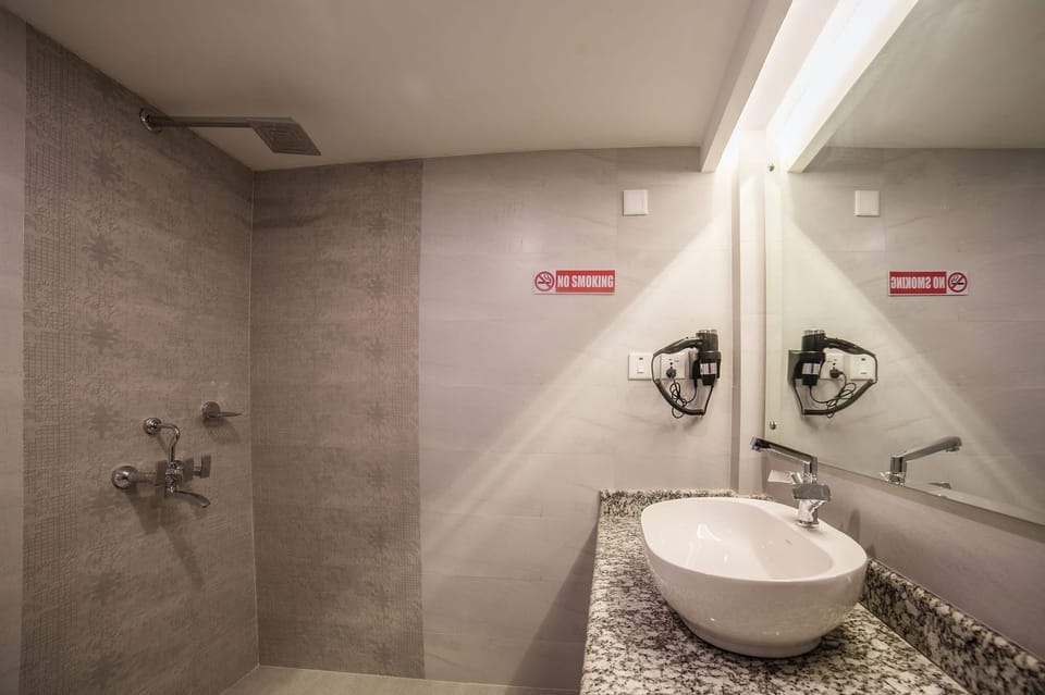 Shower, slippers, towels, soap