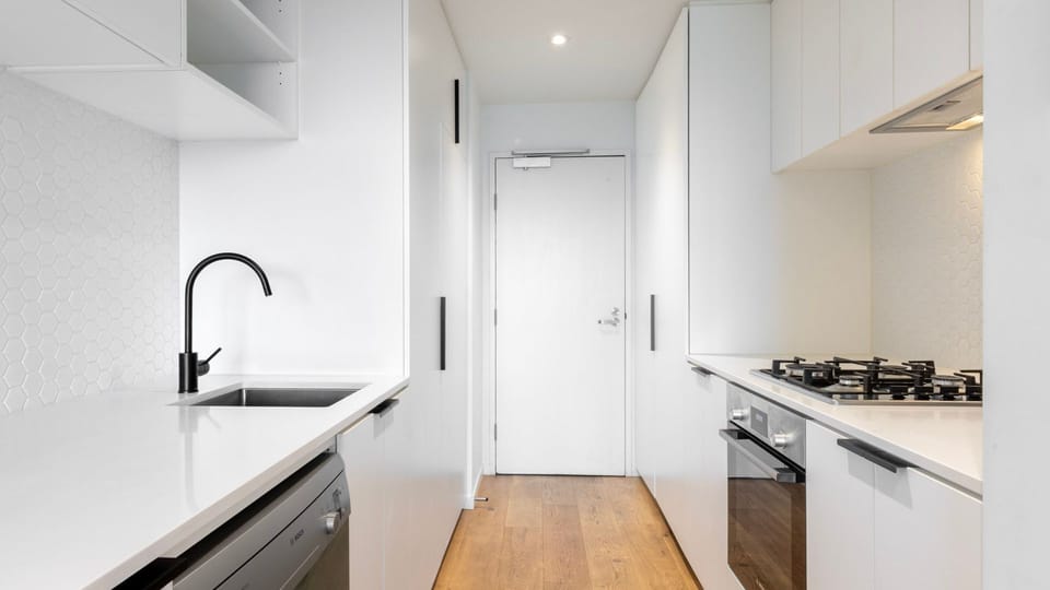 Fully equipped kitchen with modern appliances and cooking essentials