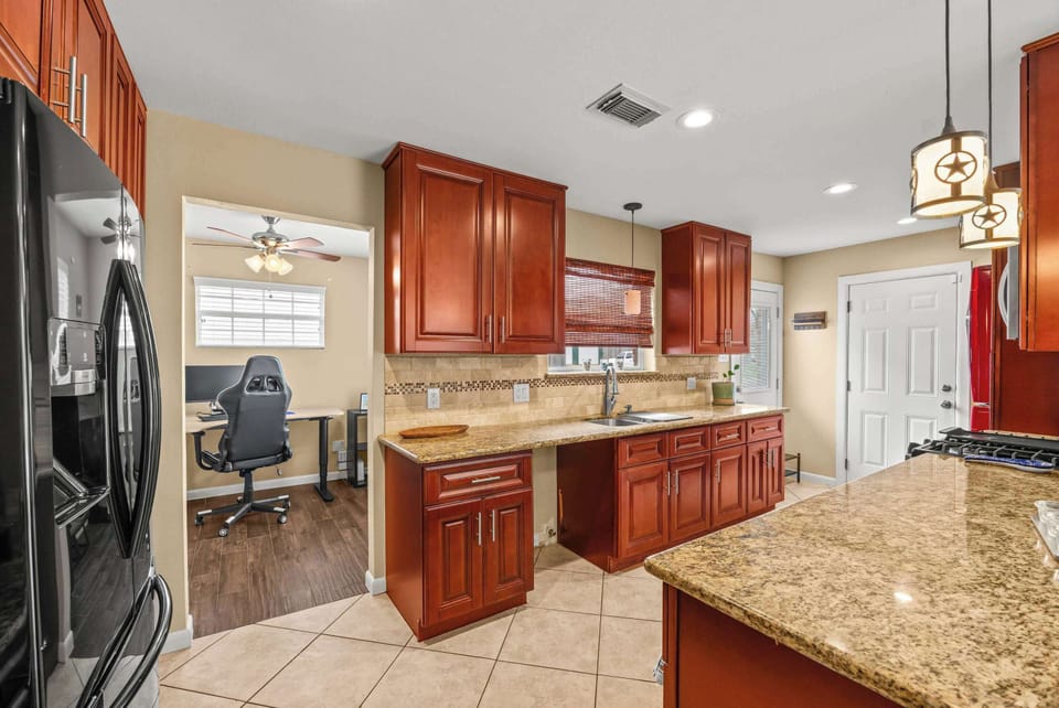 Kitchen Haven: Experience culinary adventures in this bright and stylish kitchen with modern flair!