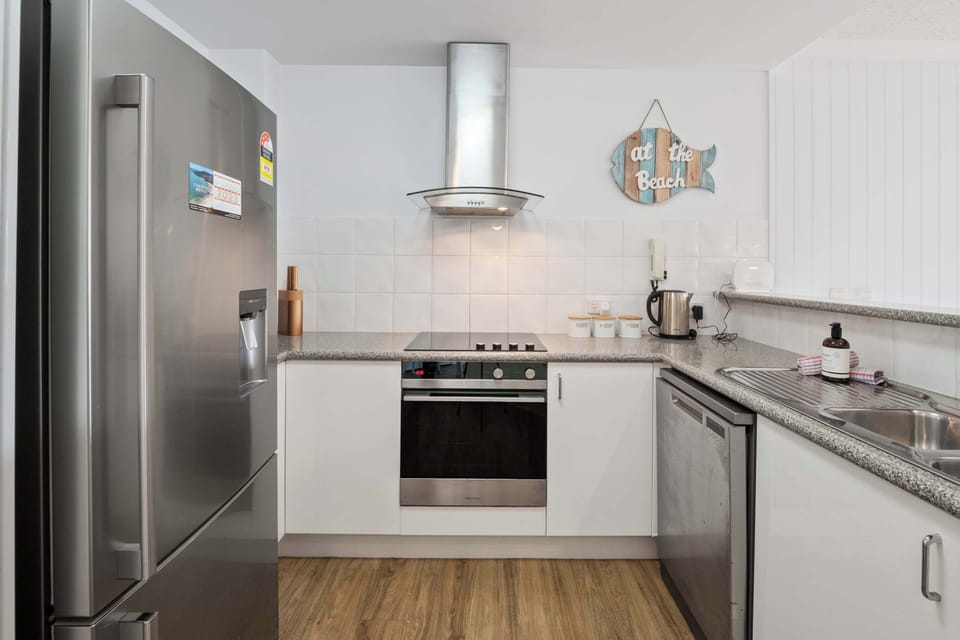 The fully equipped kitchen makes cooking at home a breeze. New photos of the renovated kitchen coming soon.