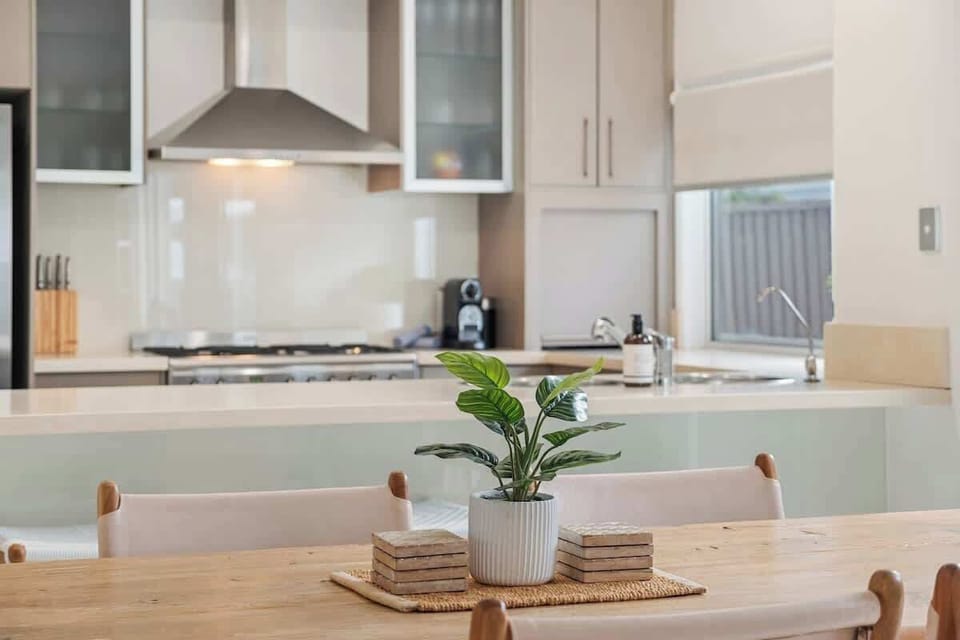 Generous kitchen with breakfast bar. 