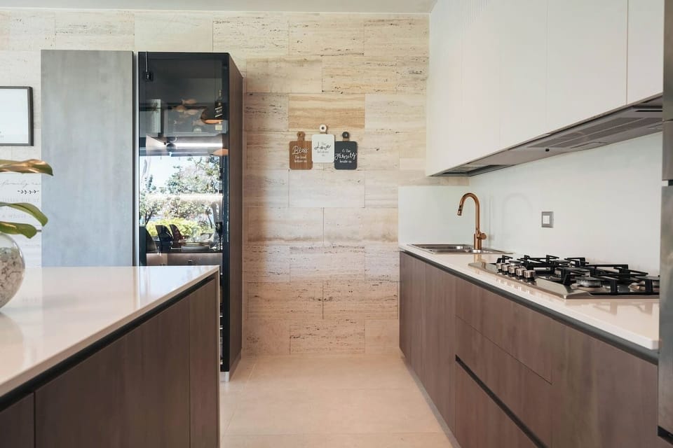 The fully equipped kitchen has everything you need to prepare meals during your stay.