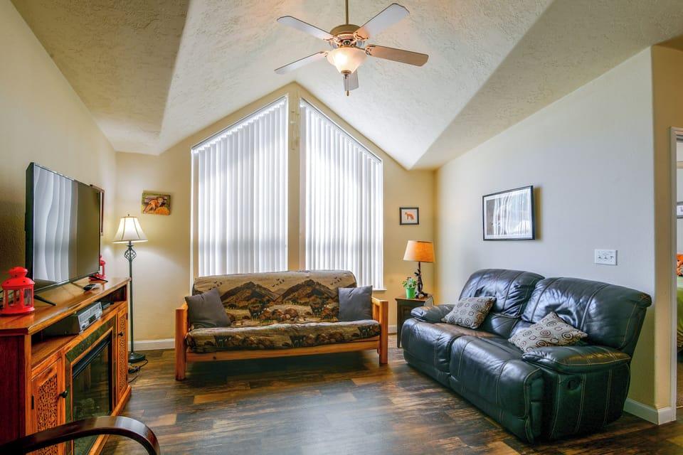 Living Room | Full Futon | Flat-Screen TV | Electric Fireplace