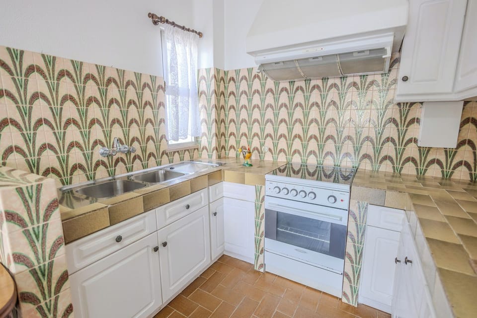 Basic Apartment, Pool View | Private kitchen | Full-size fridge, microwave, oven, stovetop