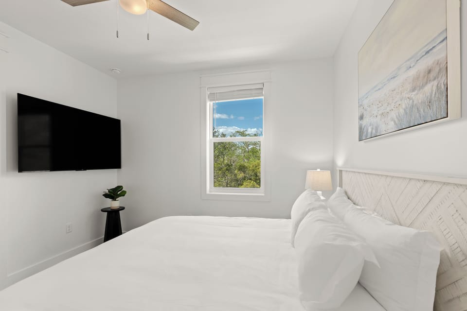 Bedroom 3 features a king bed and an ensuite bath.