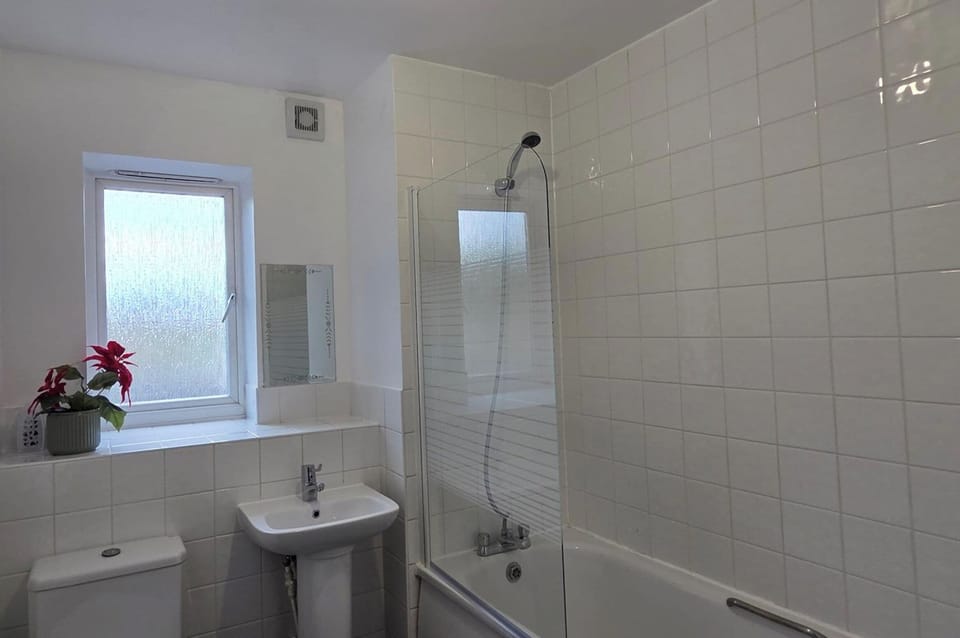 Combined shower/tub, deep soaking tub