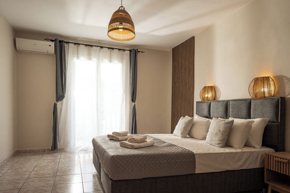 Comfort Suite, Garden View | In-room safe, desk, iron/ironing board, free WiFi