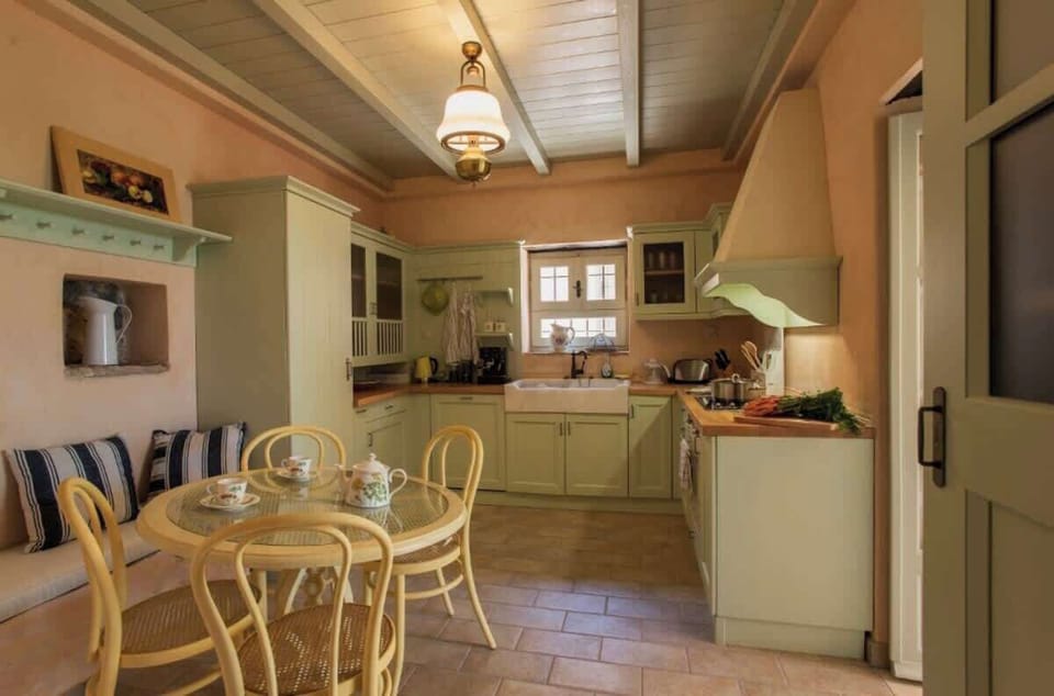Bright kitchen and dining area with traditional details