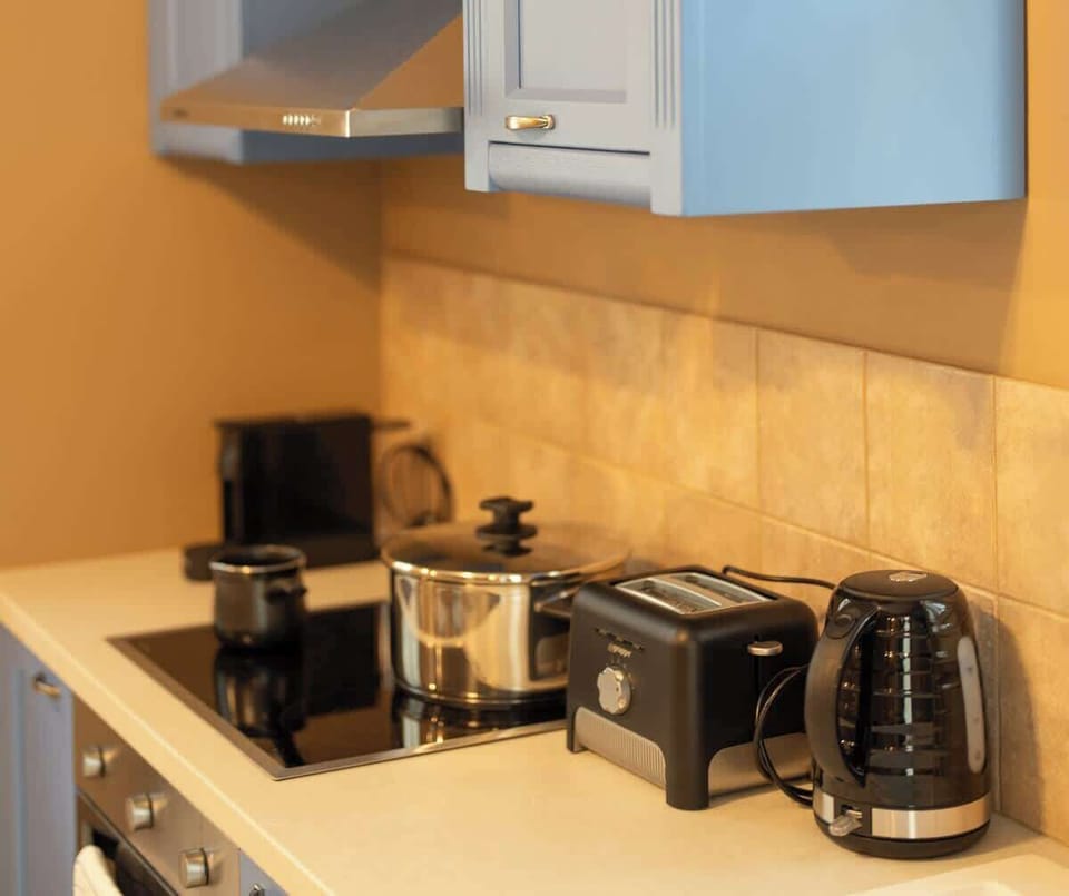 Kitchen details with modern appliances for everyday convenience.