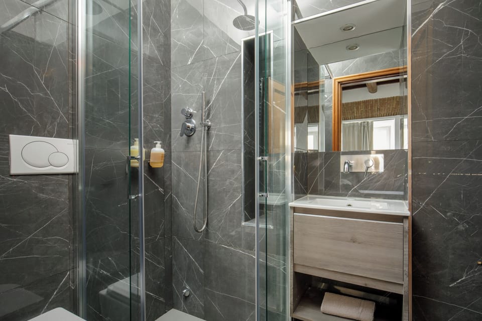 Shower, free toiletries, hair dryer, towels