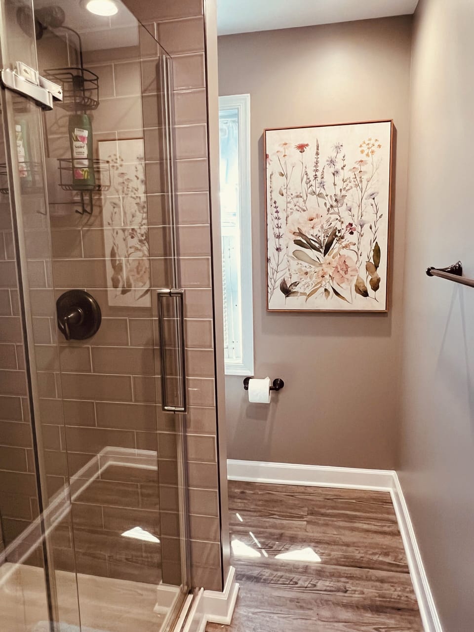 Lovely renovated full bath with large glass and tile shower