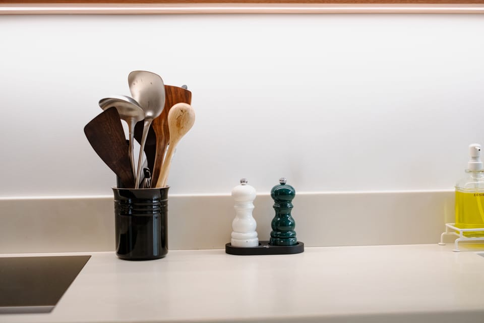 Design Apartment, 2 Bedrooms | Private kitchen | Mini-fridge, oven, stovetop, dishwasher