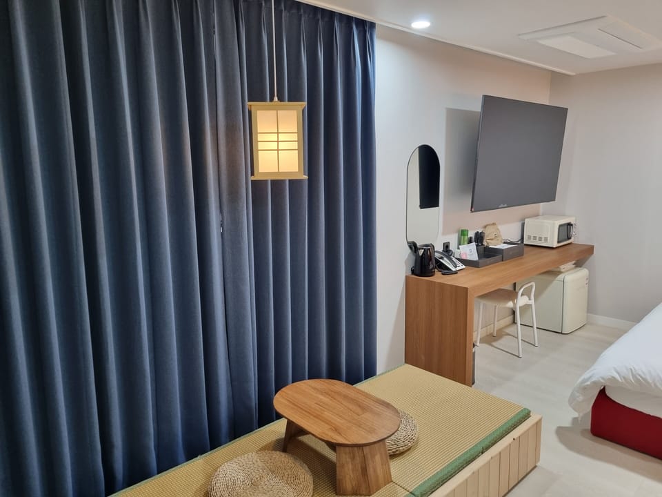 Luxury Double Room, City View | Desk, laptop workspace, blackout drapes, soundproofing