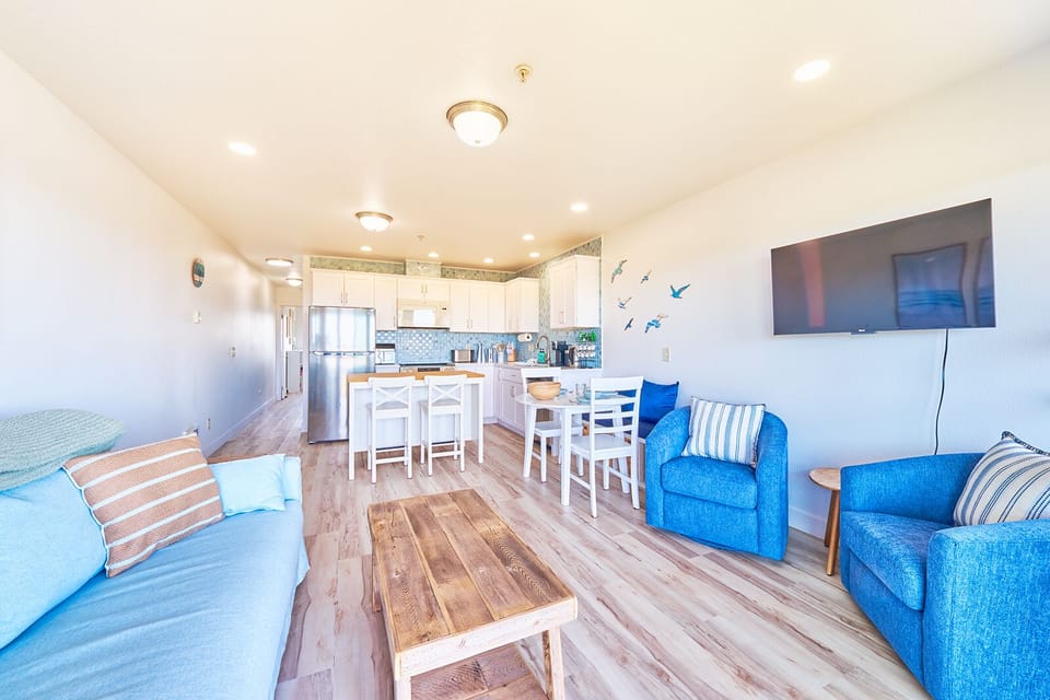 Open concept living, kitchen, dining