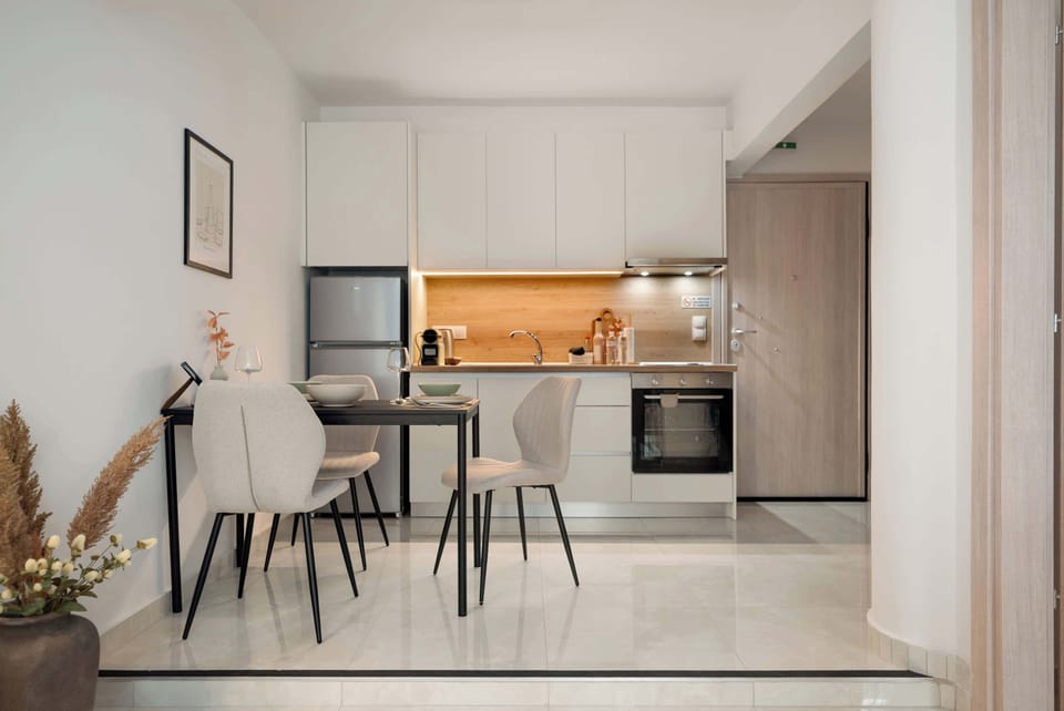 Dining Area
Stylish dining area in an open-plan space, ideal for meals or remote work, offering a welcoming and functional setting.
